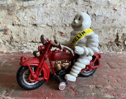 Cast Iron Ornament Michelin Man on Red Motorcycle like Harley Davidson 