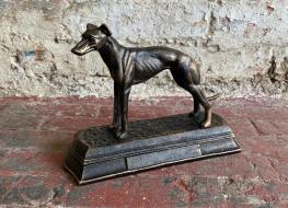 small greyhound figure