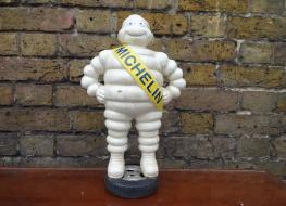 Michelin Man Standing On Tyre