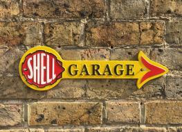 Shell garage arrow sign