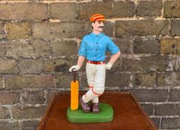 Cricketer doorstop