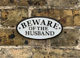 Beware of the husband sign