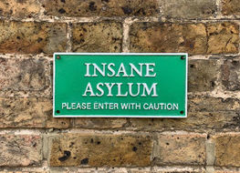 green insane asylum plaque