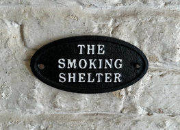 the smoking shelter sign