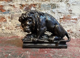 Lion &amp; boar on metal base