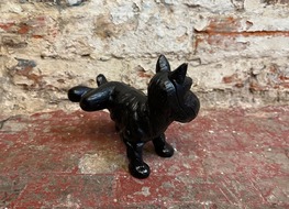 urinating dog doorstop