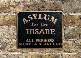black asylum for insane plaque